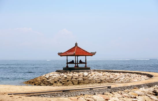 The two men relaxing at seaside. Bali. Indonesia