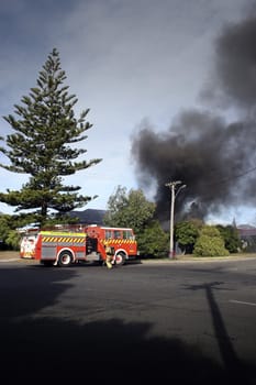 Firemen attending a house fire in Haumoana, New Zealand