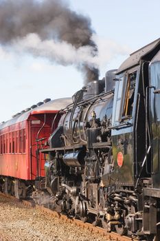 A steam train chugging through Hawke's Bay, New Zealand