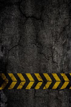 
Asphalt background texture with construction signs
