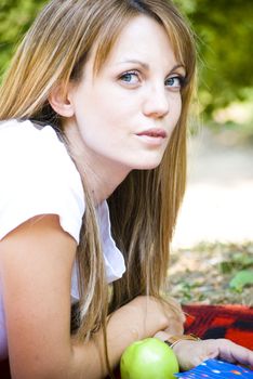 beautiful young woman working out with laptop and reading books