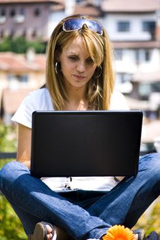 beautiful young woman working out with laptop or notebook