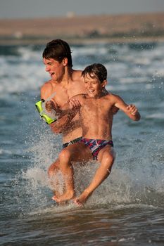 people series: two boy are play the game on sea
