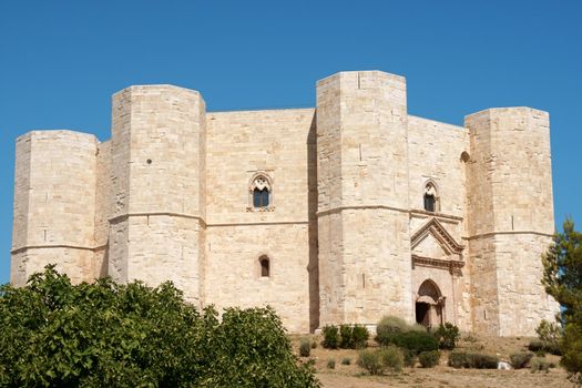 Castel del Monte (Castle of the Mount) is situated on a solitary hill, in the southeast italian region of Apulia, near Andria in the province of Bari. It was built in the 13th century during the reign of the Holy Roman Emperor Frederick II. The castle is an octagonal prism with an octagonal bastion at each corner. Each floor has 8 rooms and an octagonal courtyard in its centre. From 1996 is a World Heritage Site of UNESCO.