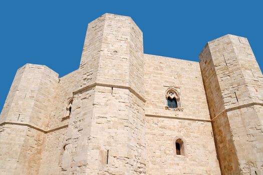 Castel del Monte (Castle of the Mount) is situated on a solitary hill, in the southeast italian region of Apulia, near Andria in the province of Bari. It was built in the 13th century during the reign of the Holy Roman Emperor Frederick II. The castle is an octagonal prism with an octagonal bastion at each corner. Each floor has 8 rooms and an octagonal courtyard in its centre. From 1996 is a World Heritage Site of UNESCO.