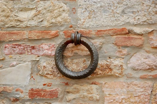 closeup of an iron ring on a wall