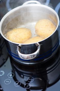 potato boiling in water