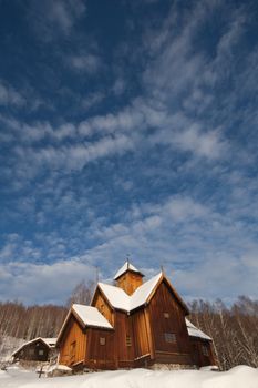 Uvdal stave church blue sky.