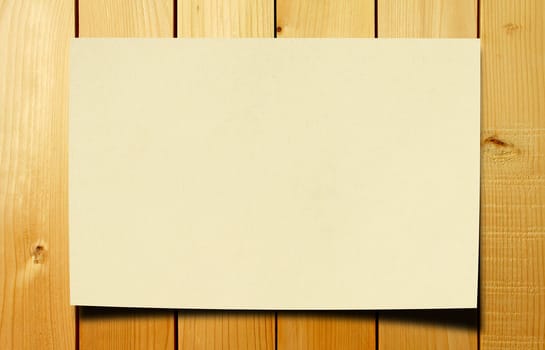 blank paper on wood background