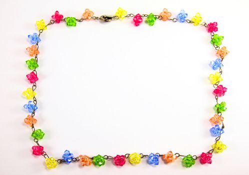 colorful necklace crystal frame on white background