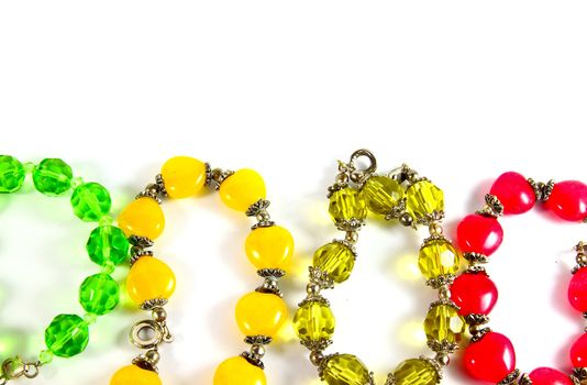 Various of bracelet with color gems on a white background