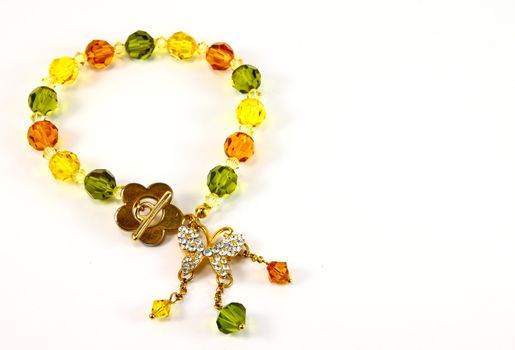 bracelet with color gems on a white background