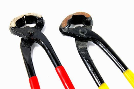 a pair of pliers on white background