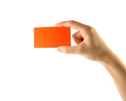 Woman's hand and orange card isolated on white
