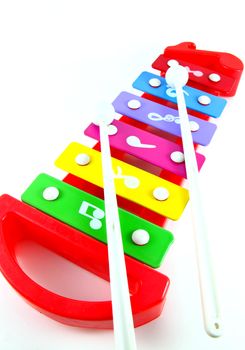 Toy colorful xylophone on white background