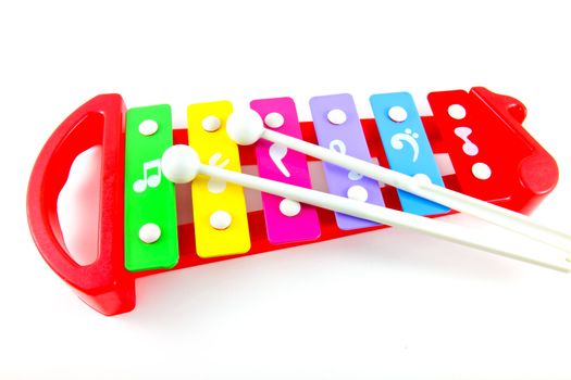 Toy colorful xylophone on white background