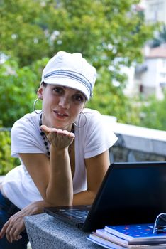 beautiful young woman working out with laptop or notebook