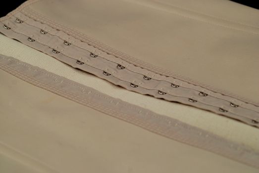 eyelets and hooks used in girdles and in corsets