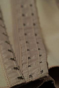 eyelets and hooks used in girdles and in corsets