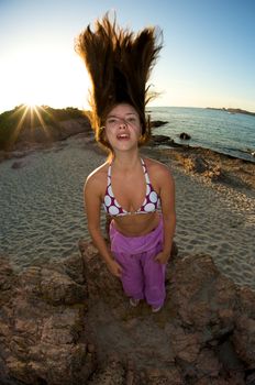 Crazy woman enjoying the beach