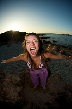 Crazy woman enjoying the beach