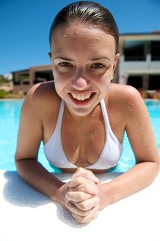 Woman relaxing in the spa swimming pool