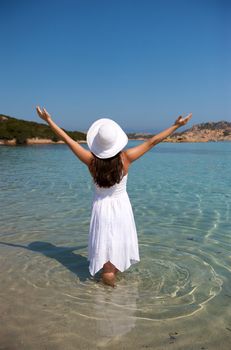 Pretty woman enjoying her vacation in Sardinia