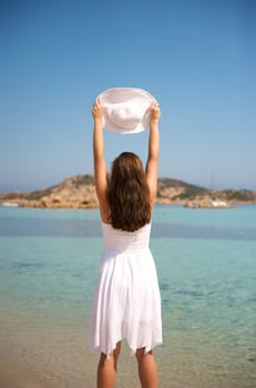 Pretty woman enjoying her vacation in Sardinia