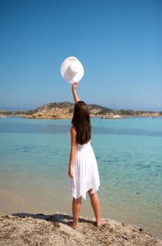 Pretty woman enjoying her vacation in Sardinia