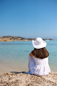 Pretty woman enjoying her vacation in Sardinia