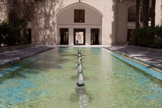 Fin garden in Kashan - Iran. A lot of fountains. Summer day