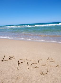 Message writing on a wonderful beach