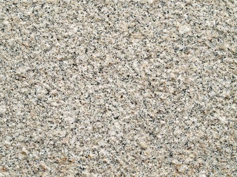 Granite background with crystalline irregular pattern. Gray granite stone.