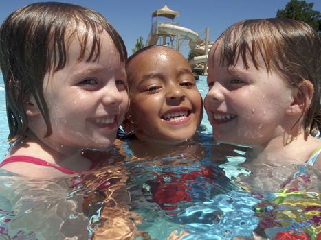 Little girl playing at neighborhood pool