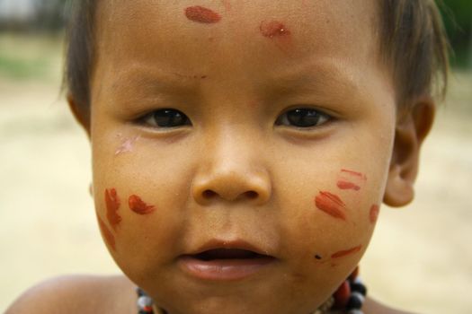 A young child photograph taken in an Amazonian tribe.