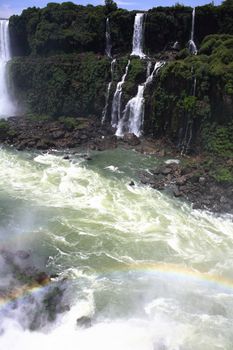 The Iguassu (or Iguazu) Falls is one of the largest masses of fresh water on the planet and divides, in South America, Brazil, Paraguay and Argentina. The waterfall system consists of 275 falls along 2.7 kilometres (1.67 miles) of the Iguazu River. Some of the individual falls are up to 82 metres (269 feet) in height, though the majority are about 64 metres (210 feet).