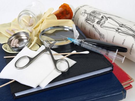 Various medical related charts and instruments isolated on a white background.