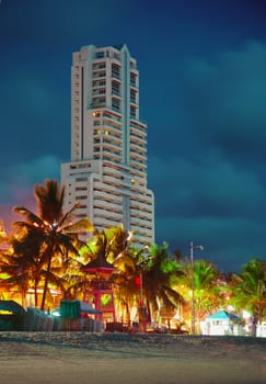 High-rise hotel on the tropical coast of southern sea