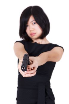 Beautiful Asian bodyguard woman holding a gun.