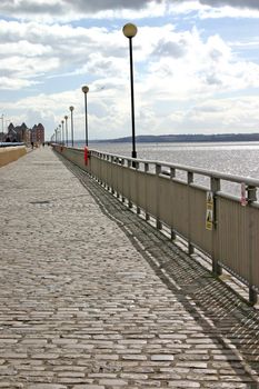 Walk alongside the river Mersey in England
