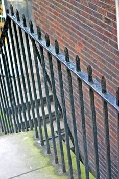 Spikes on top of metal railings