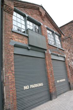 No Parking Outside 2 Roller Doors of Business