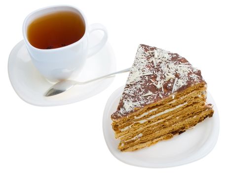 piece of honey cake and tea cup, isolated on white