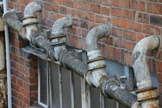 Waste Pipes Outside Public Toilets