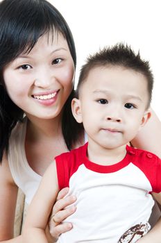 Happy smiling young mother and her son.
