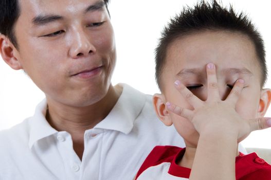 Portrait of Asian Chinese father and son.