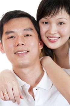 Portrait of Young Asian couple with smiling face.
