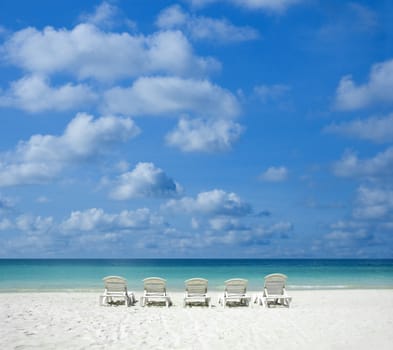 Concept photo of beach with chair. 