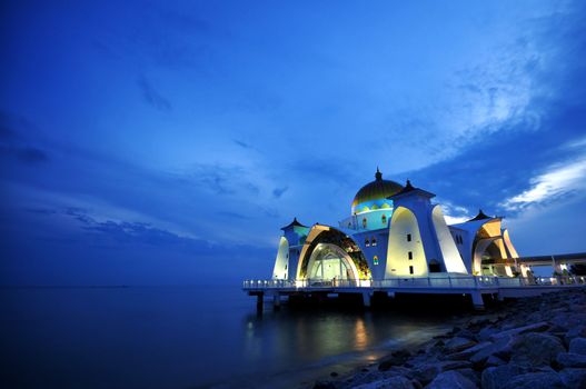 The Selat Melaka Mosque at Melaka, Malaysia in dusk.