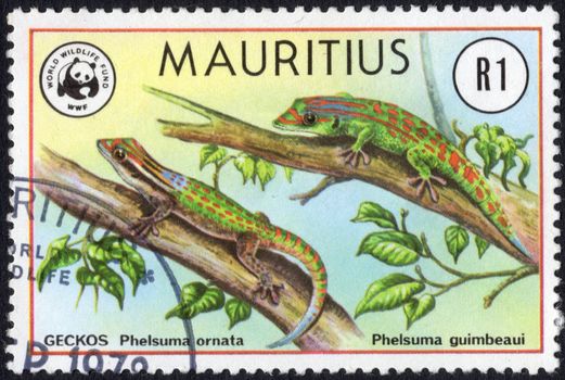 A Postage Stamp from Mauritius showing an Ornate Day Gecko (Phelsuma Ornata) and an Orange spotted day gecko(Phelsuma guimbeaui)